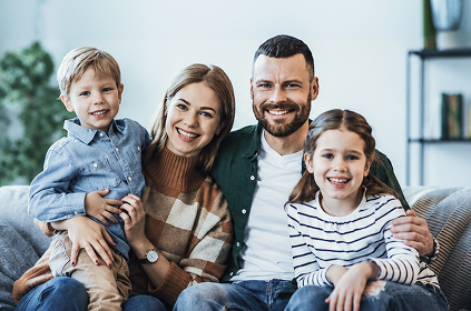 The Morrison family sits together at home.